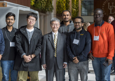 Majid Aziz, Monis Anwar, Hao Chen, Professor Tsu-Wei Chou, Ashish Chouhan, Utsav Aryal, Gbenga Taiwo and Tiankuo Chu are pictured at the STAR Tower, where a symposium was held to honor Chou's 50th anniversary at UD.