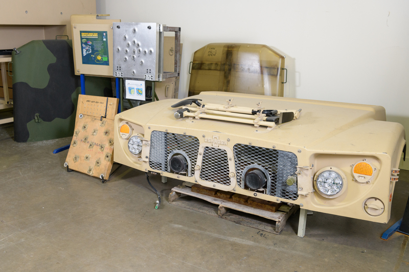 Humvee vehicle hood made from composite materials.